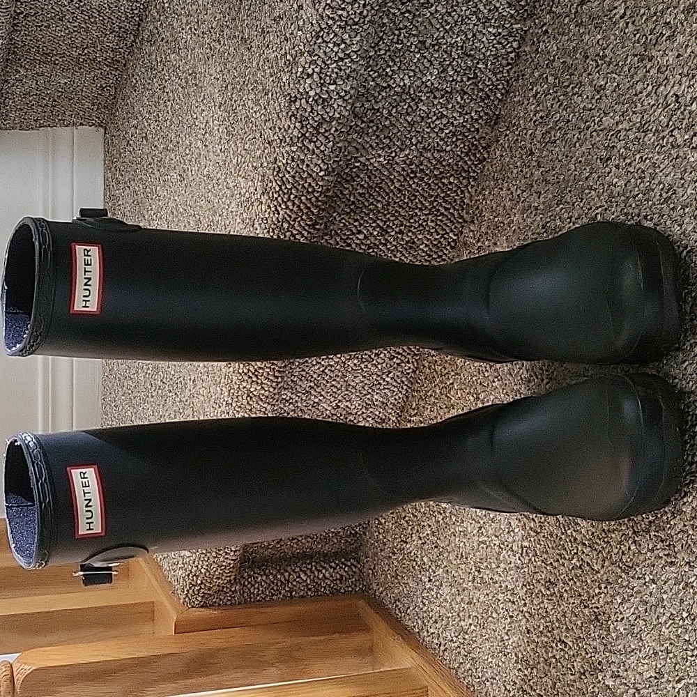 Hunter boots. Black. Size 7. Comes with boot socks.